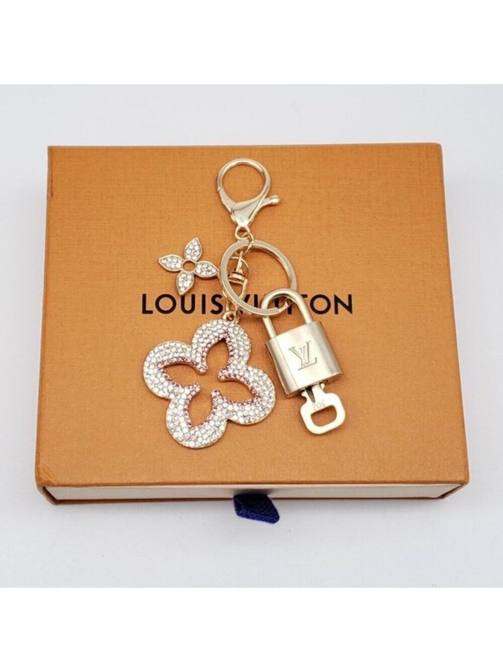 Authentic Louis Vuitton Gold Lock & Box w/ Unbranded Clover Bagcharm